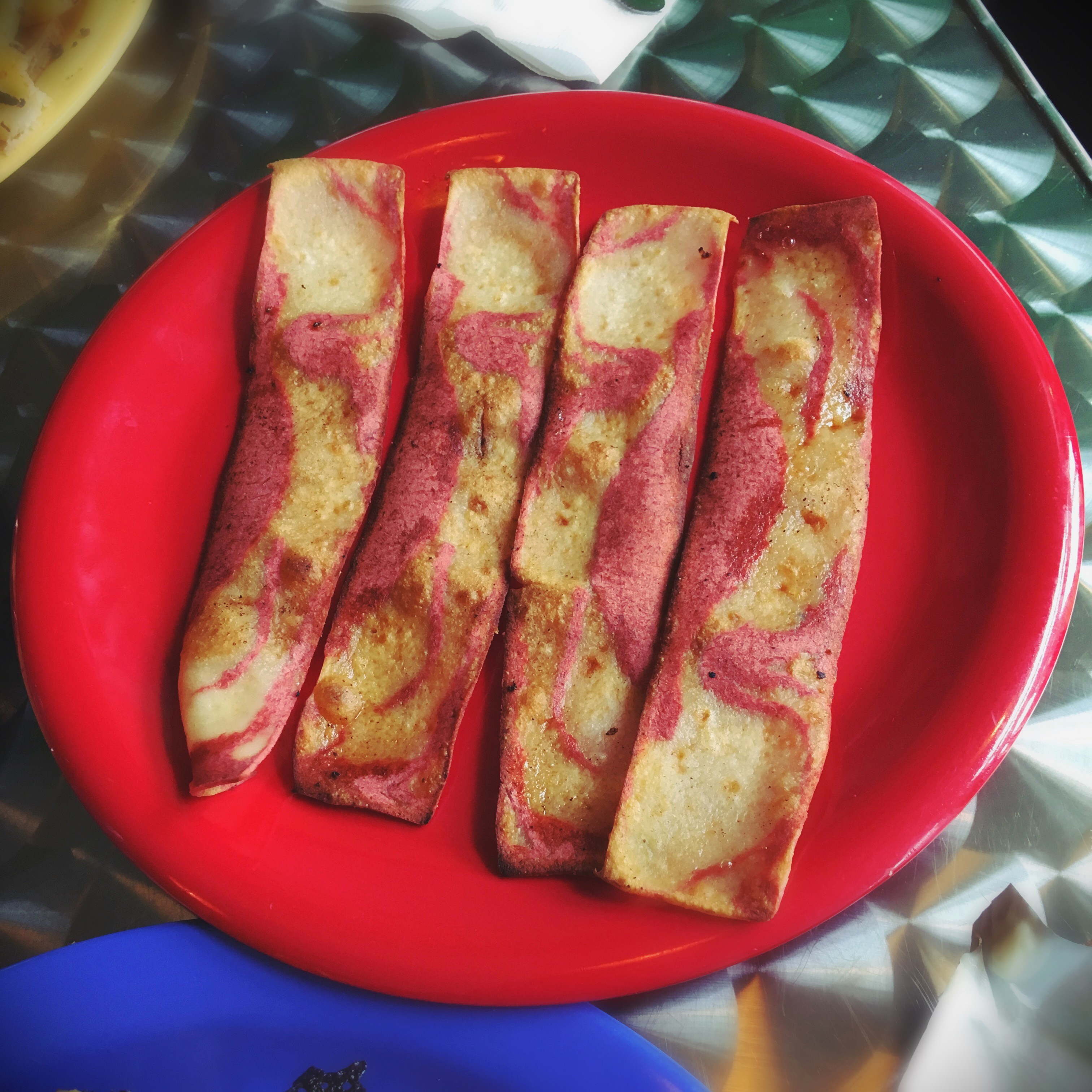 Like the Friendly Toast itself, this bacon looks like a cartoon.